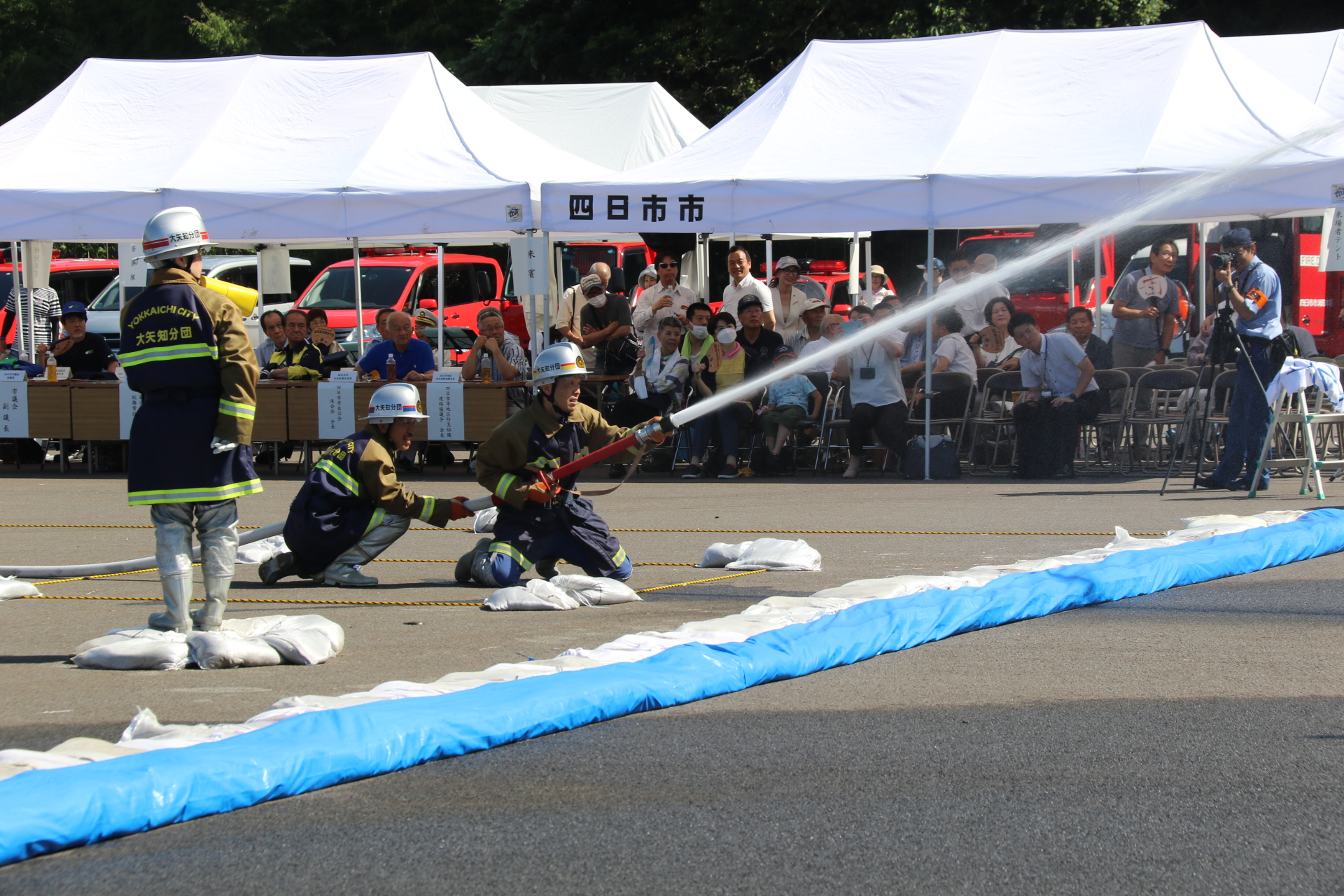 力強い動きに声援   四日市市消防団操法競技大会　市総合防災拠点で開催