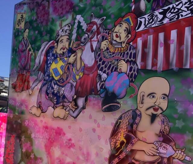 七福神が草競馬を楽しむ様子を描いたデコトラのイラスト