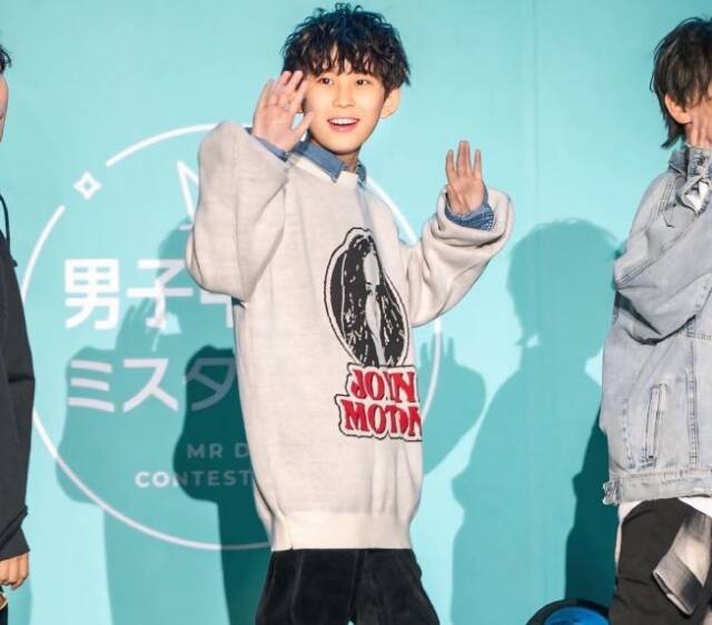 ステージに立つ豊田さん