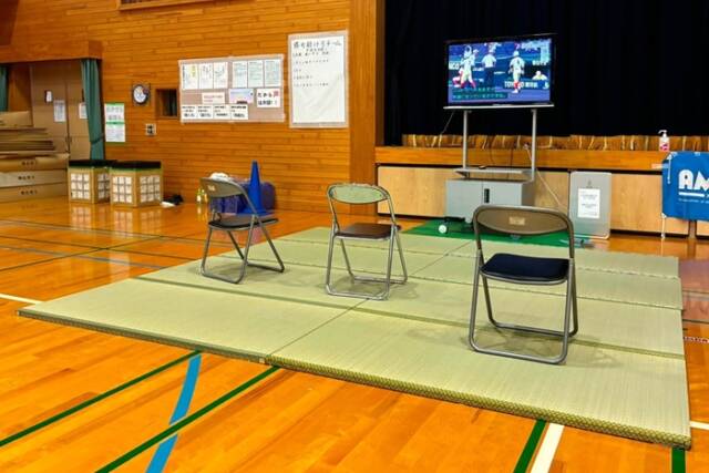 避難所の体育館に設けられた畳の共有スペース